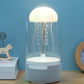 Rotating LED lamp with integrated speaker 